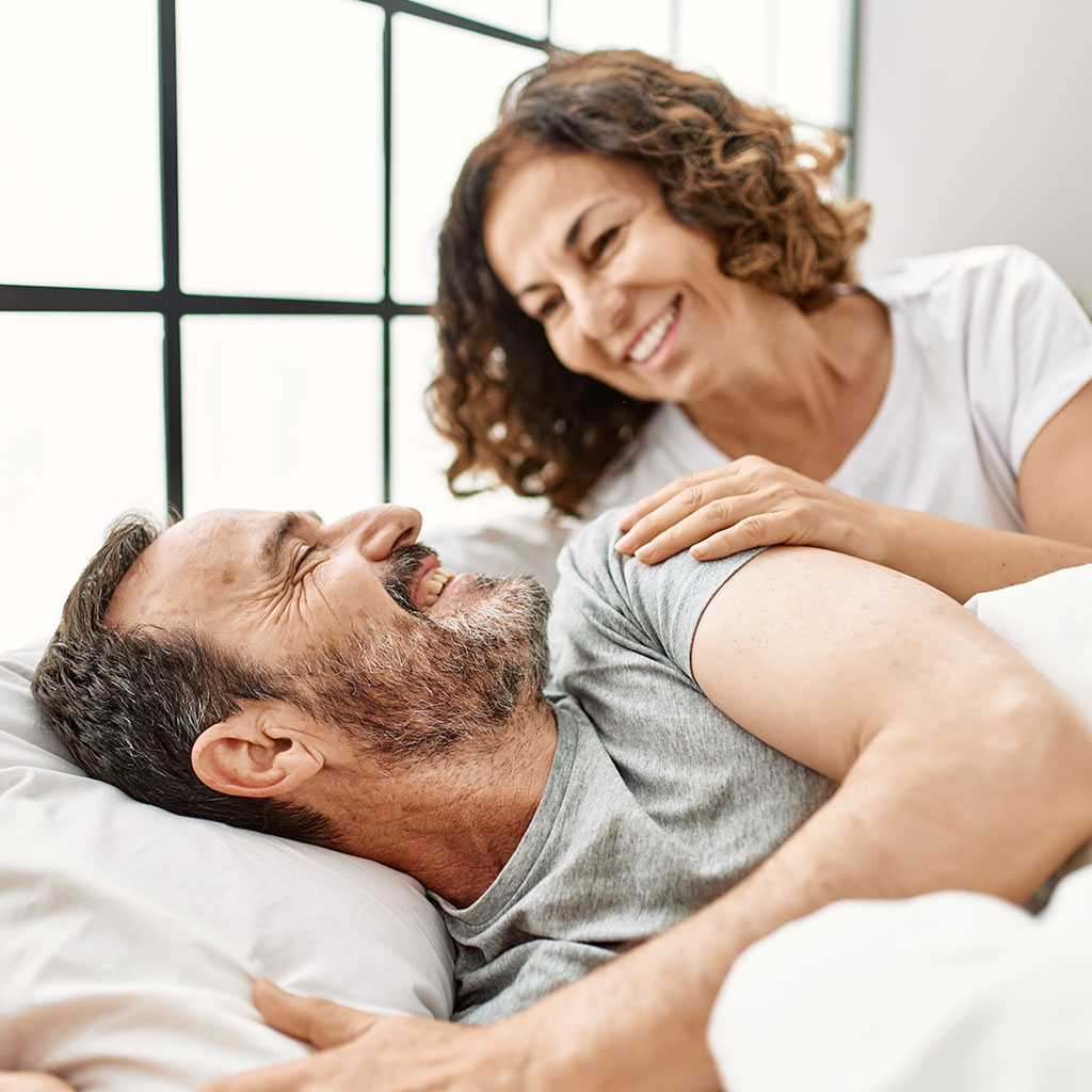 Man And Woman In Bed